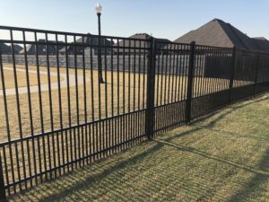Some styles of ornamental iron will make a beautiful small dog fence.