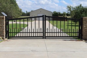 Automated gate and grand driveway installation by Fence OKC