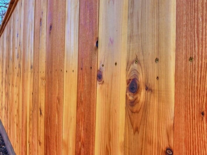 A beautifully stained cedar fence installed in OKC, Oklahoma by Fence OKC.