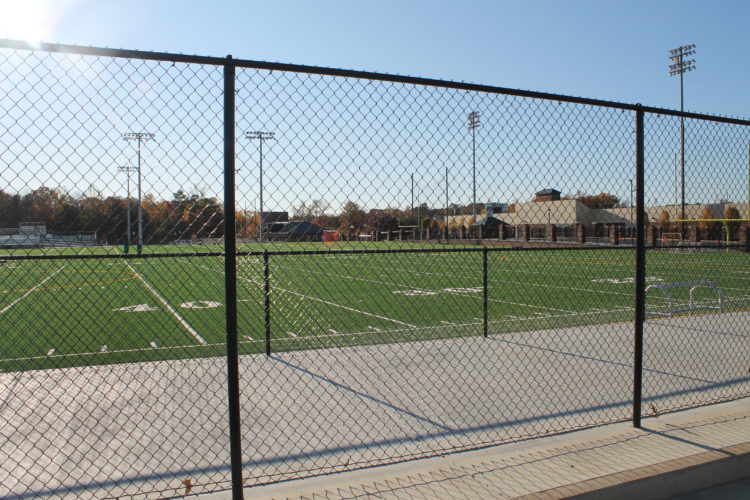 Commercial chain link fence installation for a Football Field in central Oklahoma by Fence OKC