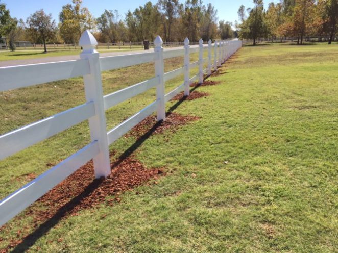 3 rail white pvc fence line installed on property in Mustang, Oklahoma by Fence OKC.