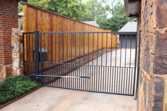 Residential automated gate installation in OKC, Oklahoma by Fence OKC.