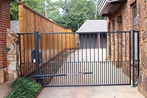 Custom driveway gates installed in central Oklahoma by Fence OKC.