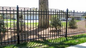 Commercial iron fence installation in central Oklahoma by Fence OKC.