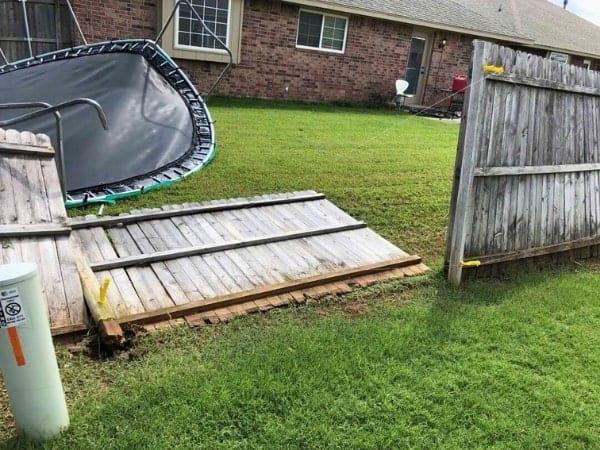 Trampoline knocks over a residential fence in Oklahoma City, Oklahoma