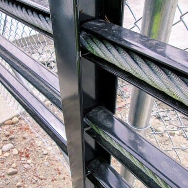 Hidden crash-rated cable barriers.