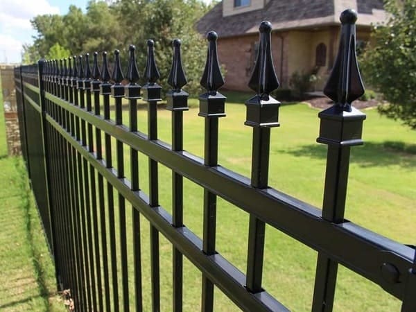 Residential ornamental iron fence installation in Oklahoma City, Oklahoma by Fence OKC.