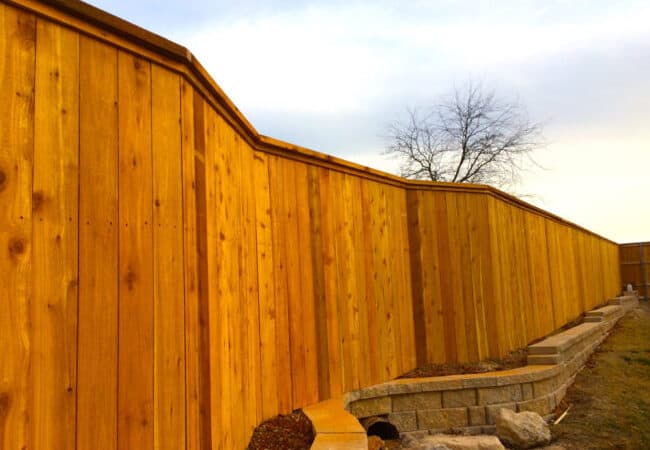 Cap and trim residential cedar fence installed by Fence OKC in Oklahoma.