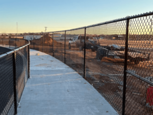 Commercial chain link fence installation in Oklahoma by Fence OKC.