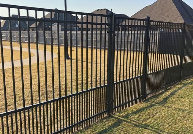 Puppy panel ornamental iron fence in Oklahoma by Fence OKC.
