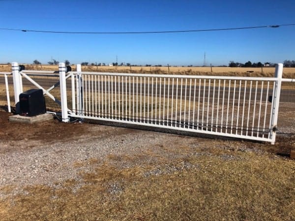 Custom automated driveway gate installation in Oklahoma.