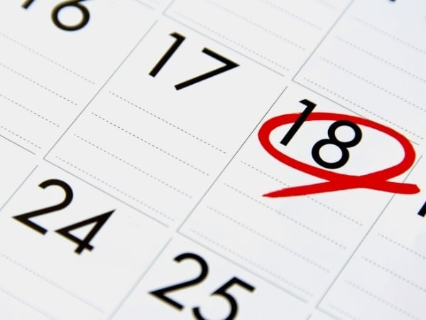 Date circled on a desk calendar for when your fence installation will start.