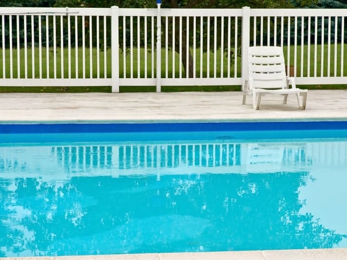 Beautiful pool safety fencing surrounding a pool in Oklahoma City, Oklahoma.